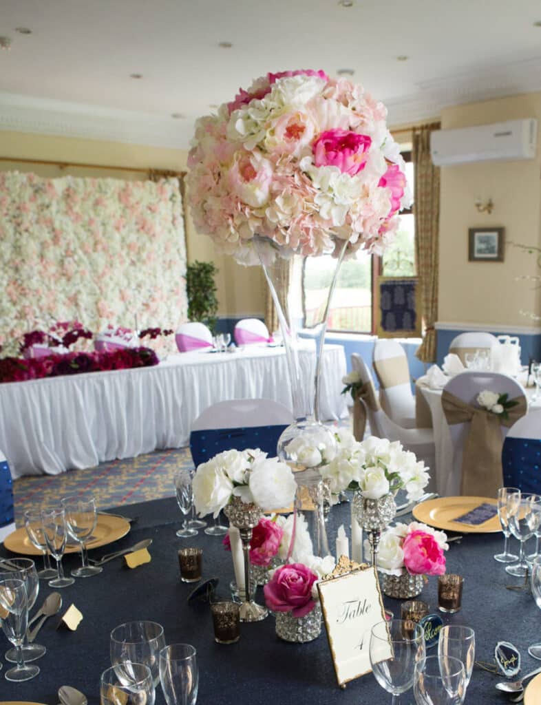 Hour Glass Vase with floral arrangement Centrepiece