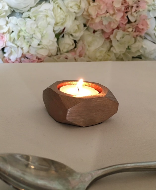 copper coloured nut shaped tea light holder