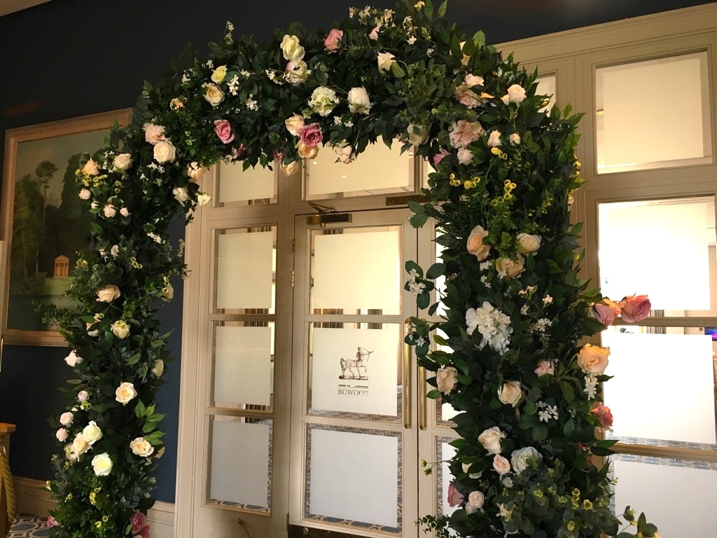 Floral Arch frames the entrance to your ceremony suite- Accessory hire from Wiltshire based venue stylist Fabulous Functions UK