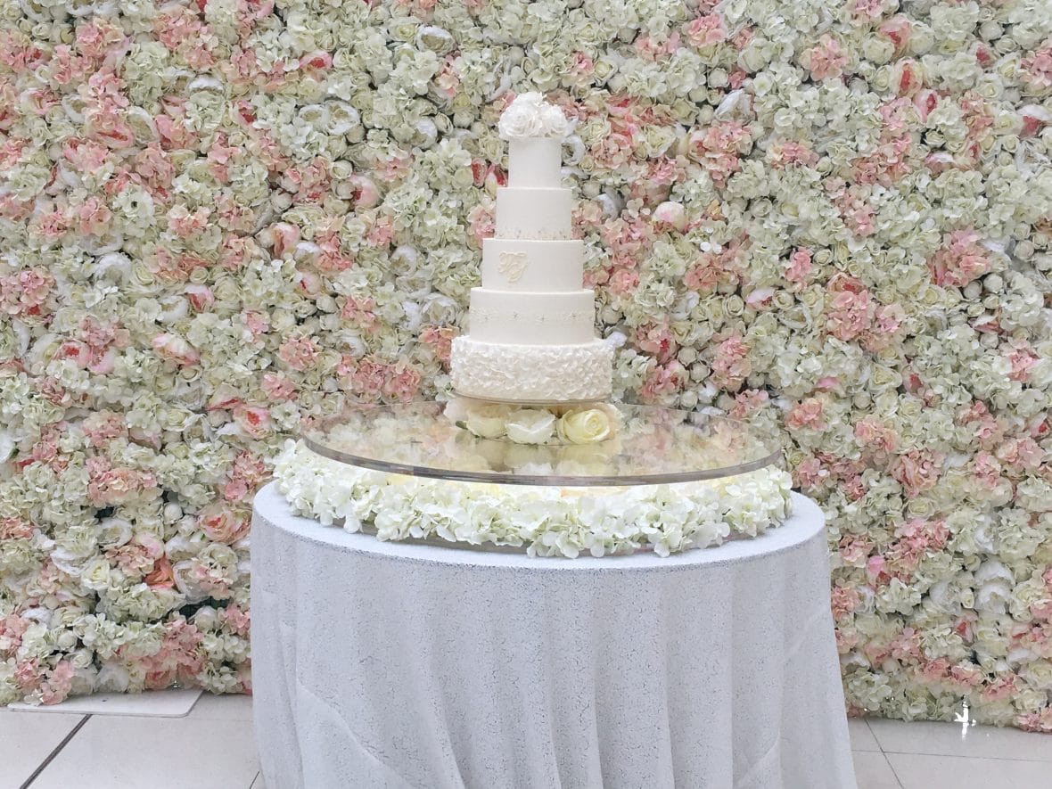 acrylic wedding cake table with sequinned table linen