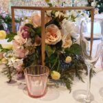 Gold toned cube frame for floral display