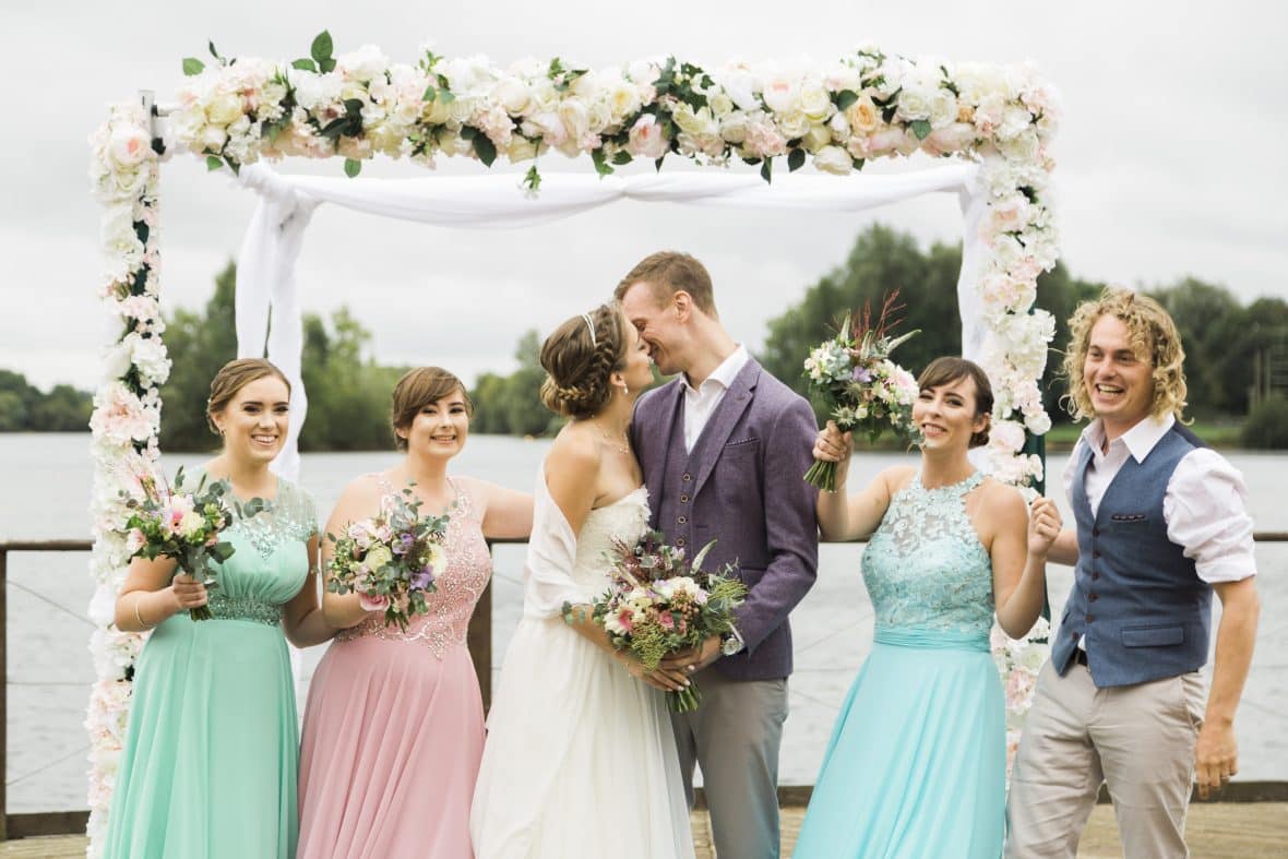 Create colour and interest with an arch for your beach themed wedding ceremony- Arch created by Fabulous Functions UK