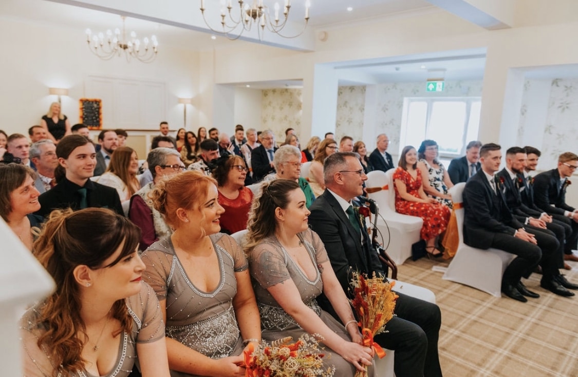  Happy guests at an autumn themed wedding