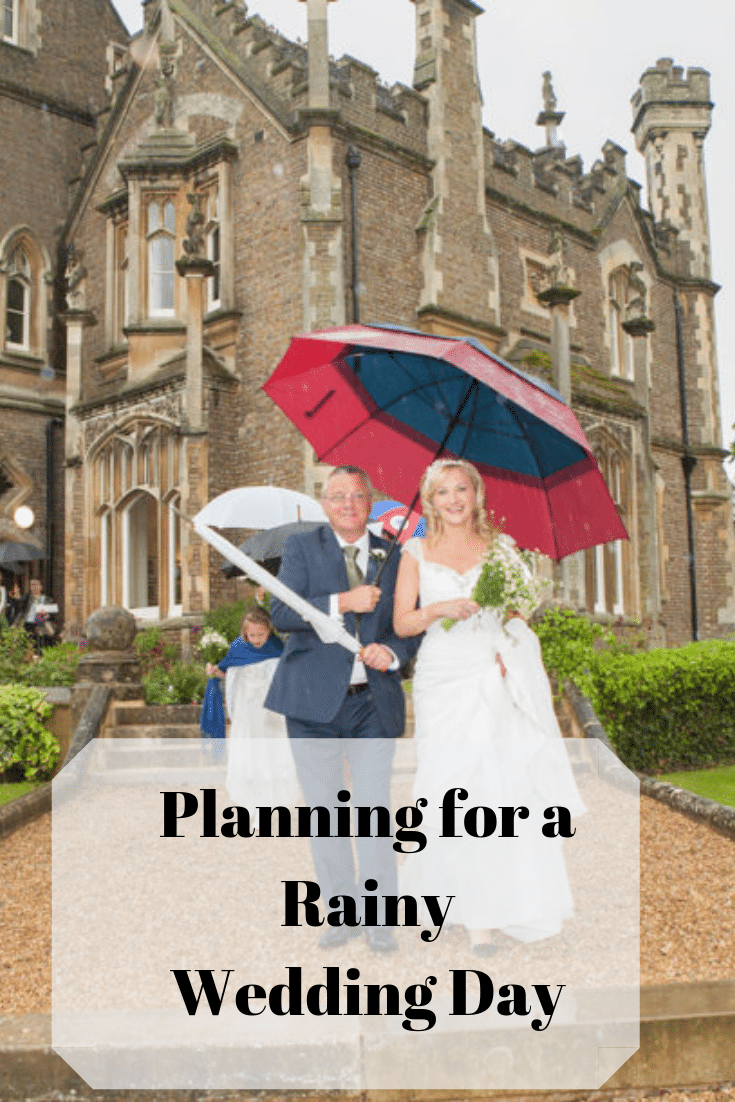 Wet Weather Wedding Planning - bridal party shelter under umbrellas.