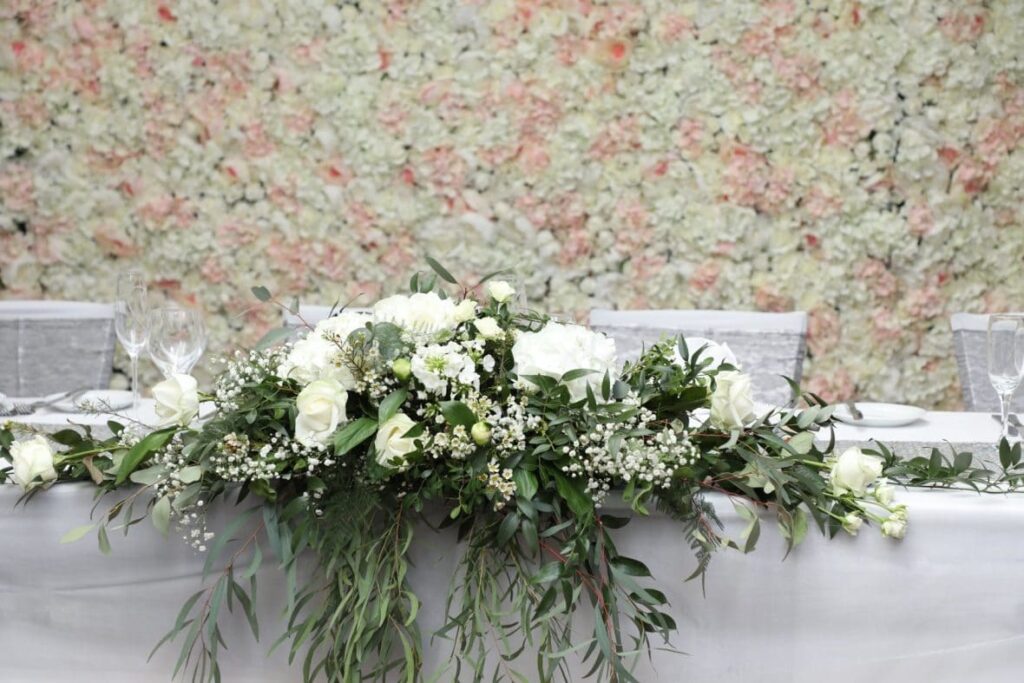 A Silver and Grey Theme - the flower wall behind the top table 