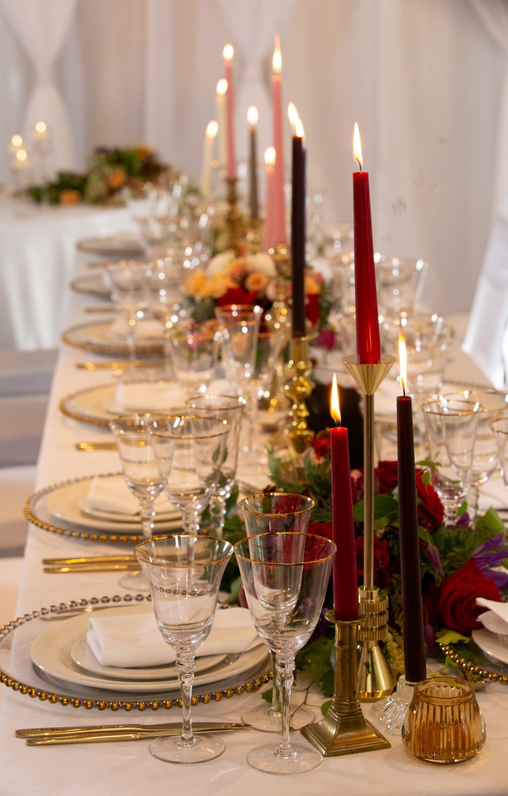 Ombre themed tablescape featuring a colour range of  burgundy,  copper and gold through to pink and the palest blush pinks at the Bear Hotel in Hungerford