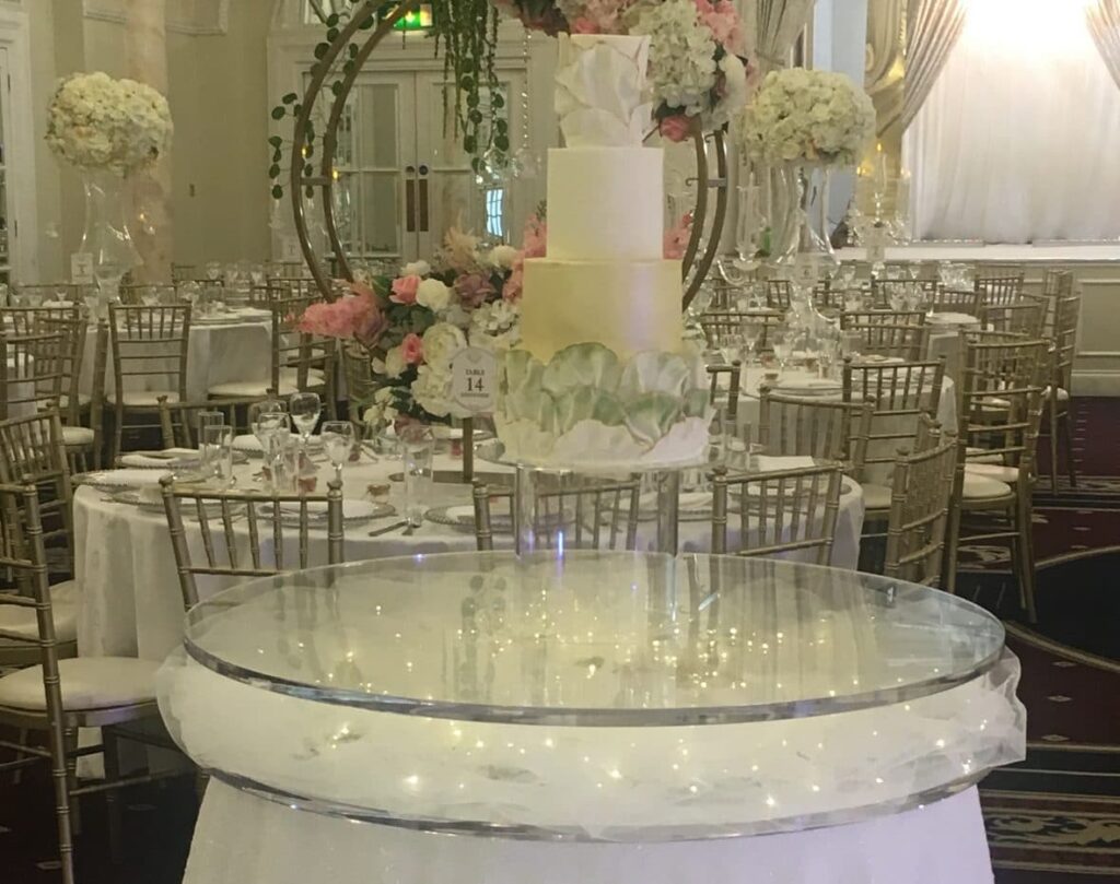 Floating Cake Stand at the Decorium-Cream gold and green themed cake-Fabulous Functions UK