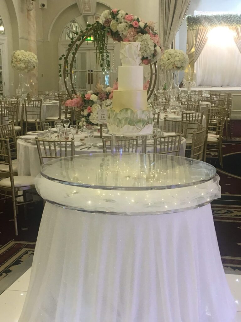 Floating cake stand was used to display this beautiful wedding cake at the Decorium London - Fabulous Functions UK