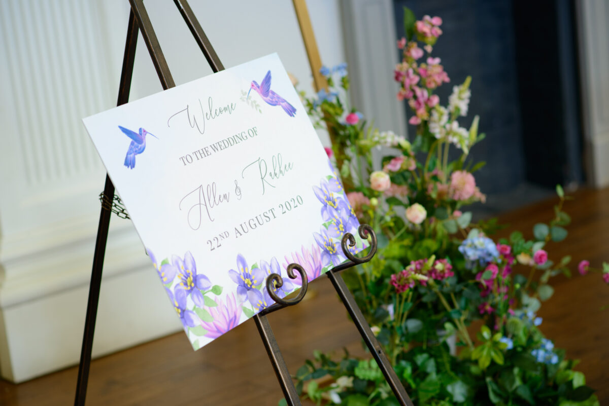 Multicultural wedding featuring a Welcome Sign with the Hummingbird and the Lotus - Fabulous Functions UK