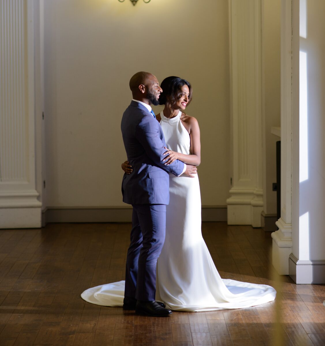 White wedding dress with soft train and delicate beading on the straps 