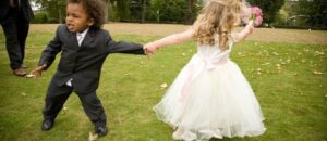 Keeping Junior Wedding Guests Happy - a small boy and girl at a wedding