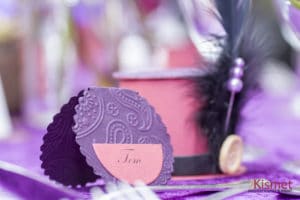 Place Cards or escort cards - a purple place card. 