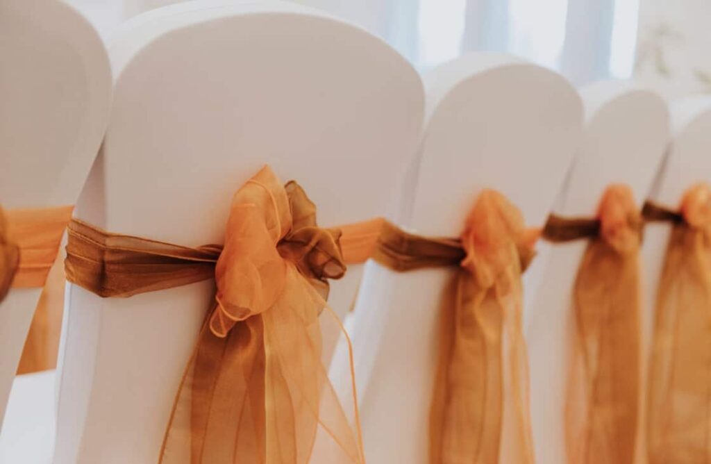 close up of orange and bronze sashes