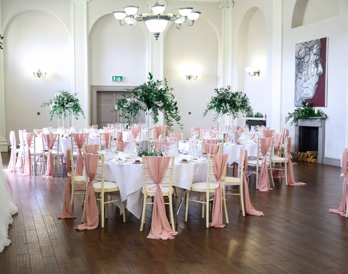 Rose gold chiffon vertical drops chiavari chair decor at the Kings Head Hotel Cirencester