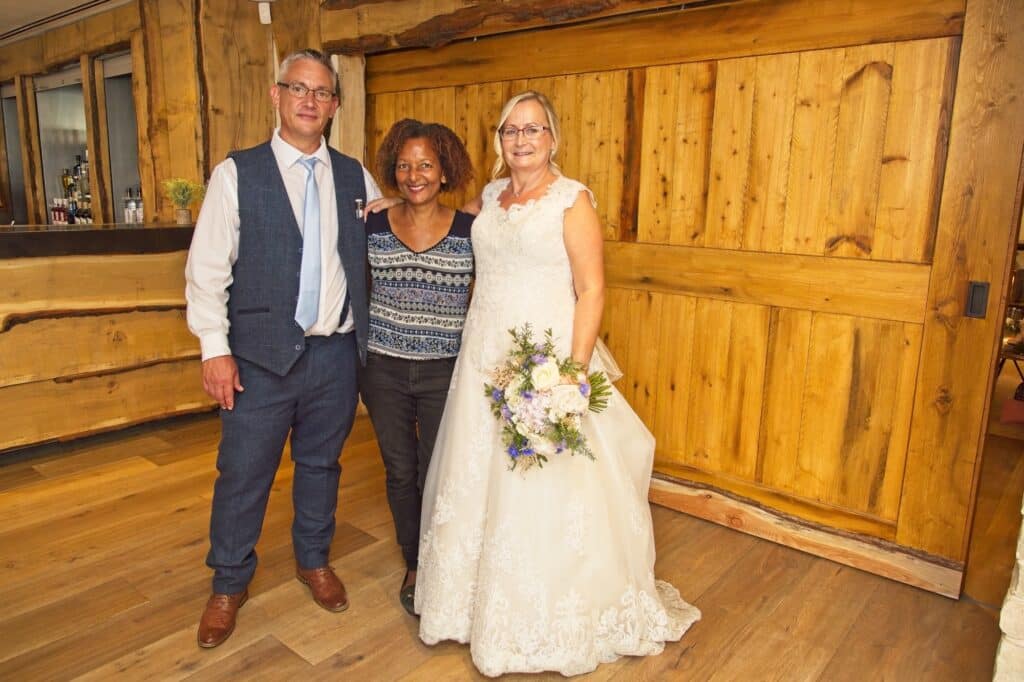 Bride and Groom Sue and Steve on their wedding day with Sandra from Fabulous Functions UK