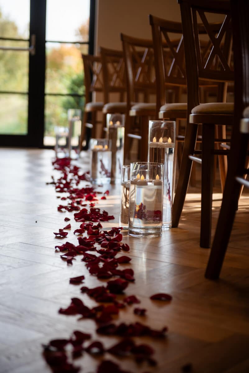 Rose Petal Aisle Decor in the Blossom Room at the Pear Tree Purton Wedding Venue