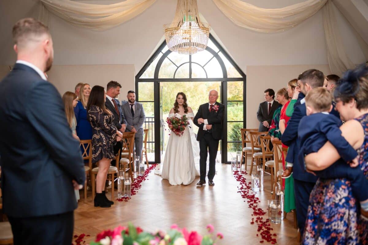 Teal-and-Burgundy-Wedding The Pear Tree Purton Wedding Venue Father Bride Entrance