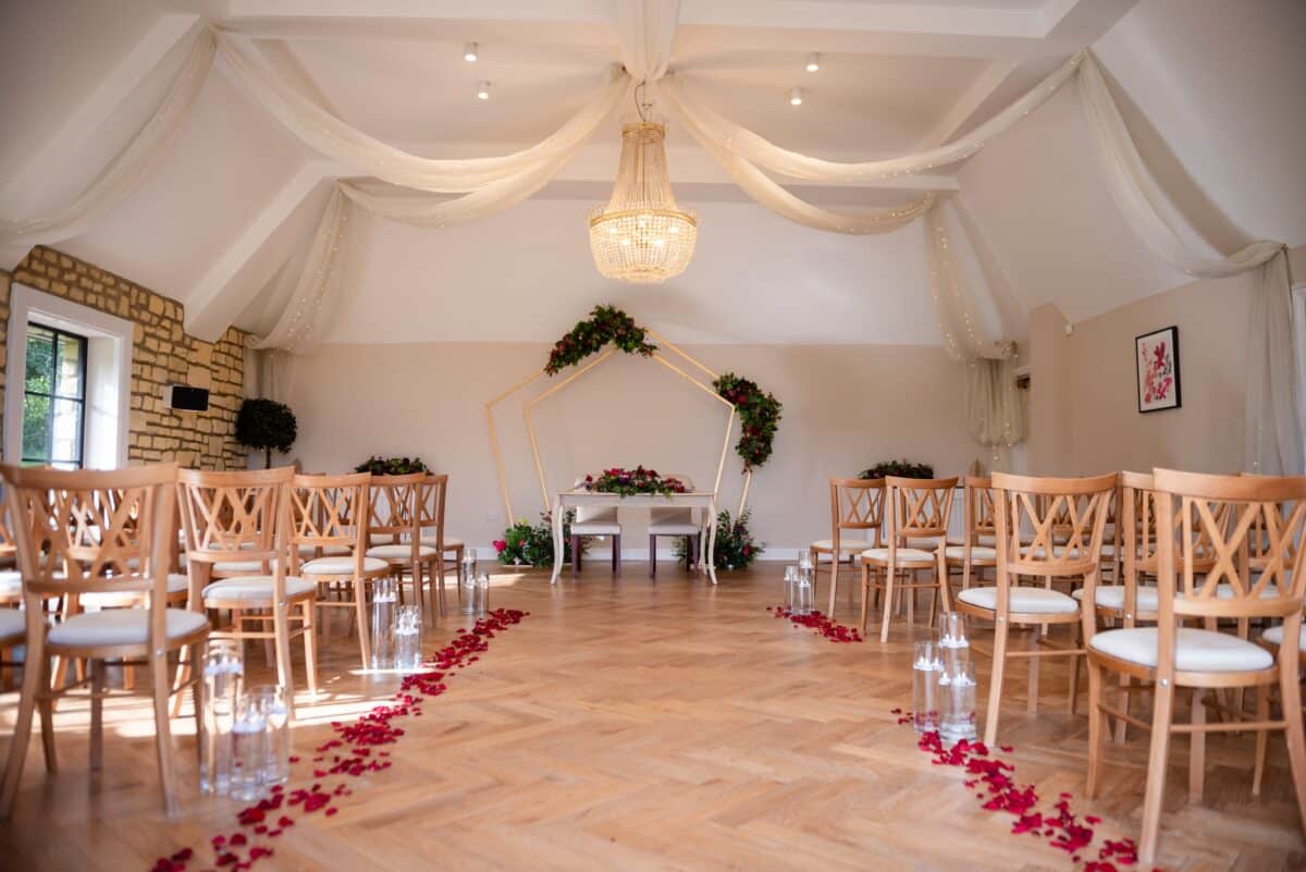 The Exposed Cotswolds stone of the Blossom- Ceremony Suite at the Pear Tree Wedding Venue in Purton