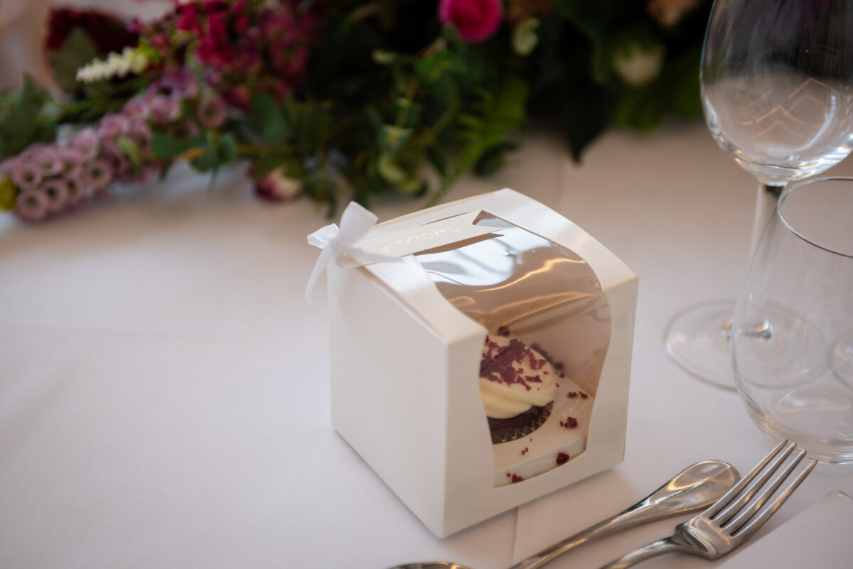 Beautifully boxed personalised guest favours for Jenna and Andrews Burgundy and Teal Wedding at the Peartree Purton Wedding Venue