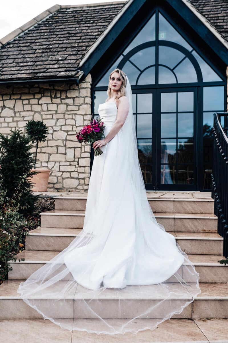 Photo opportunity on the stairs at the Pear Tree Wedding Venue in Purton