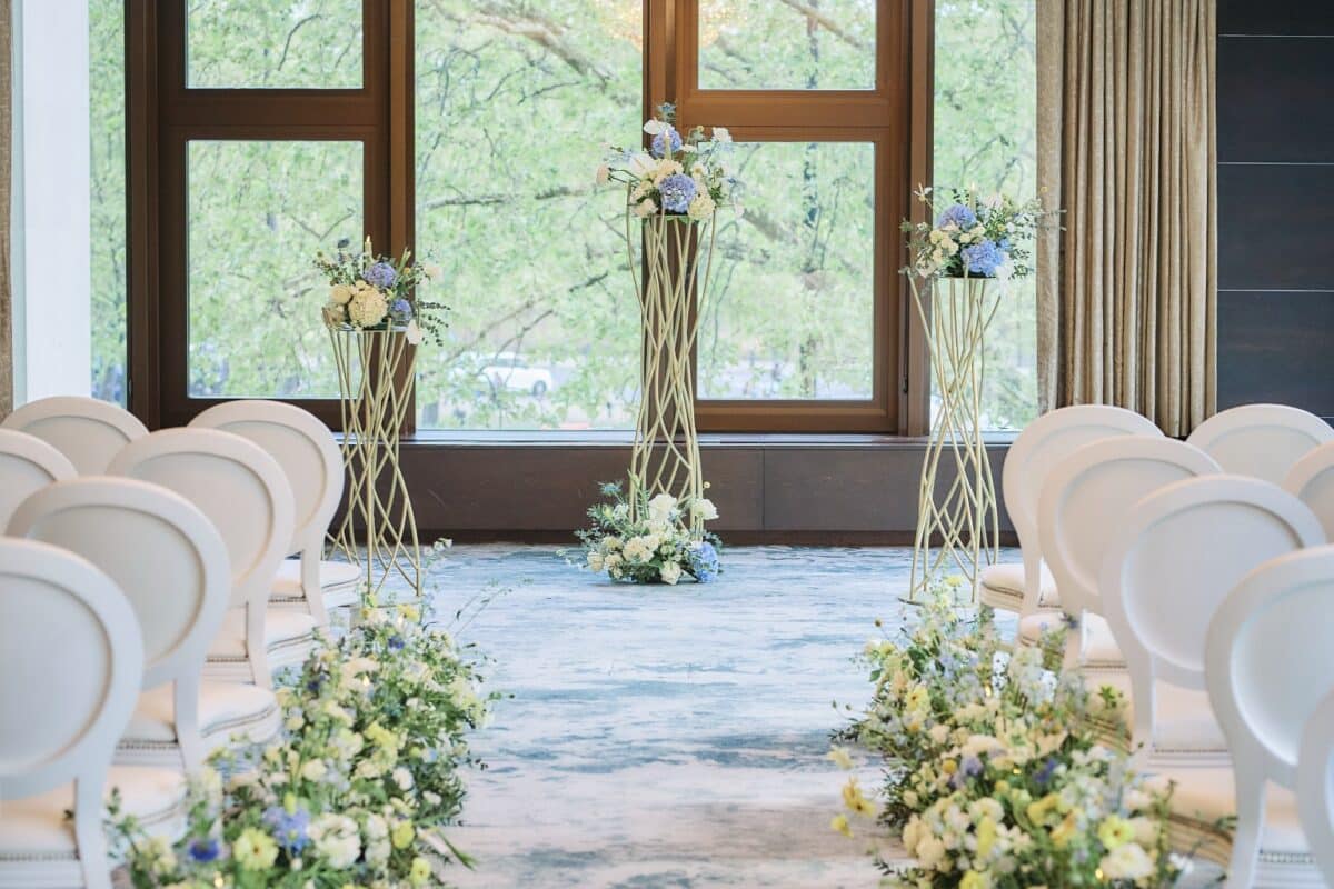 Gold floral stands and Aisle meadows at the Intercontinental Lark Lane London