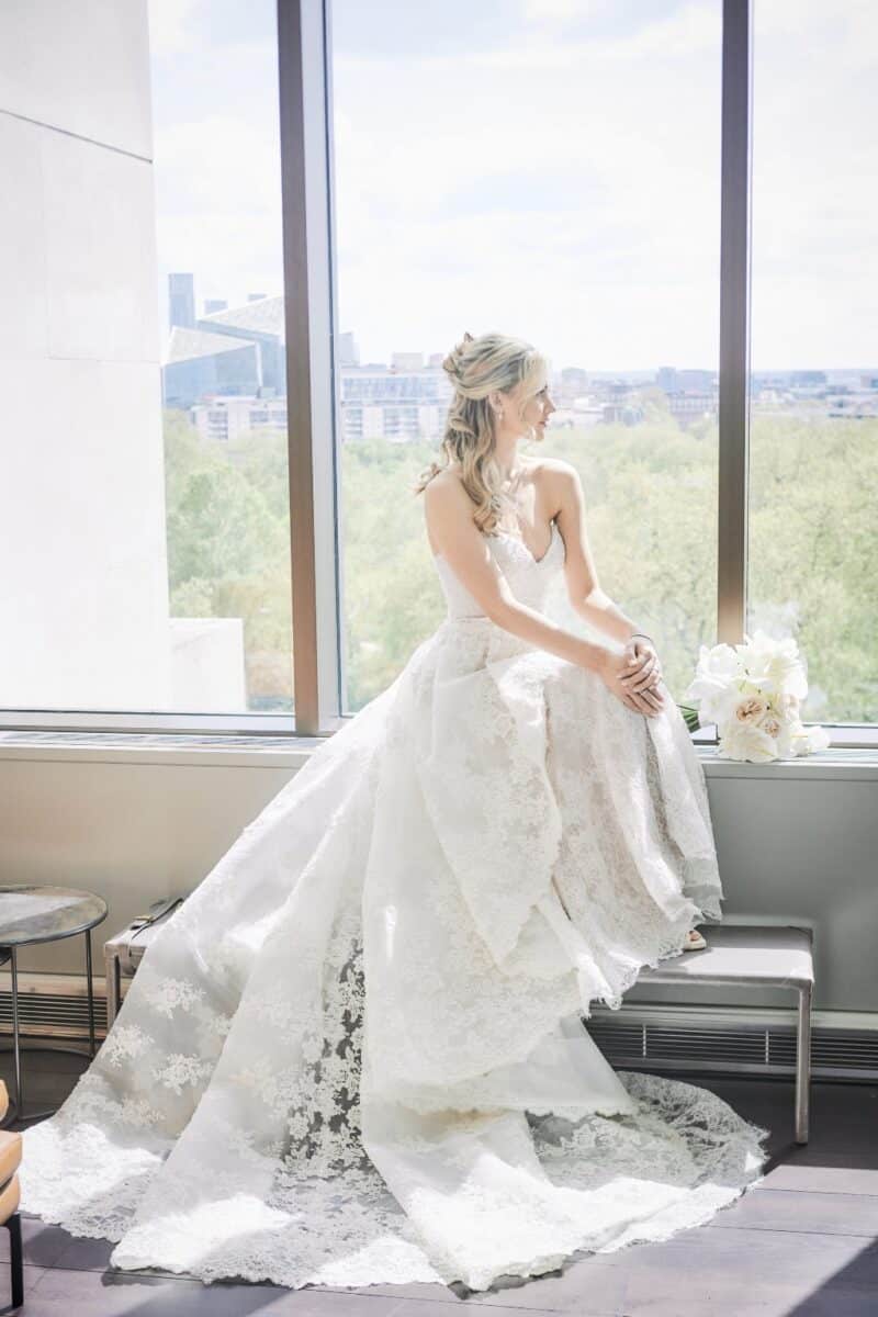 Bride looking at Hyde Park From Intercontinental Park Lane Hotel