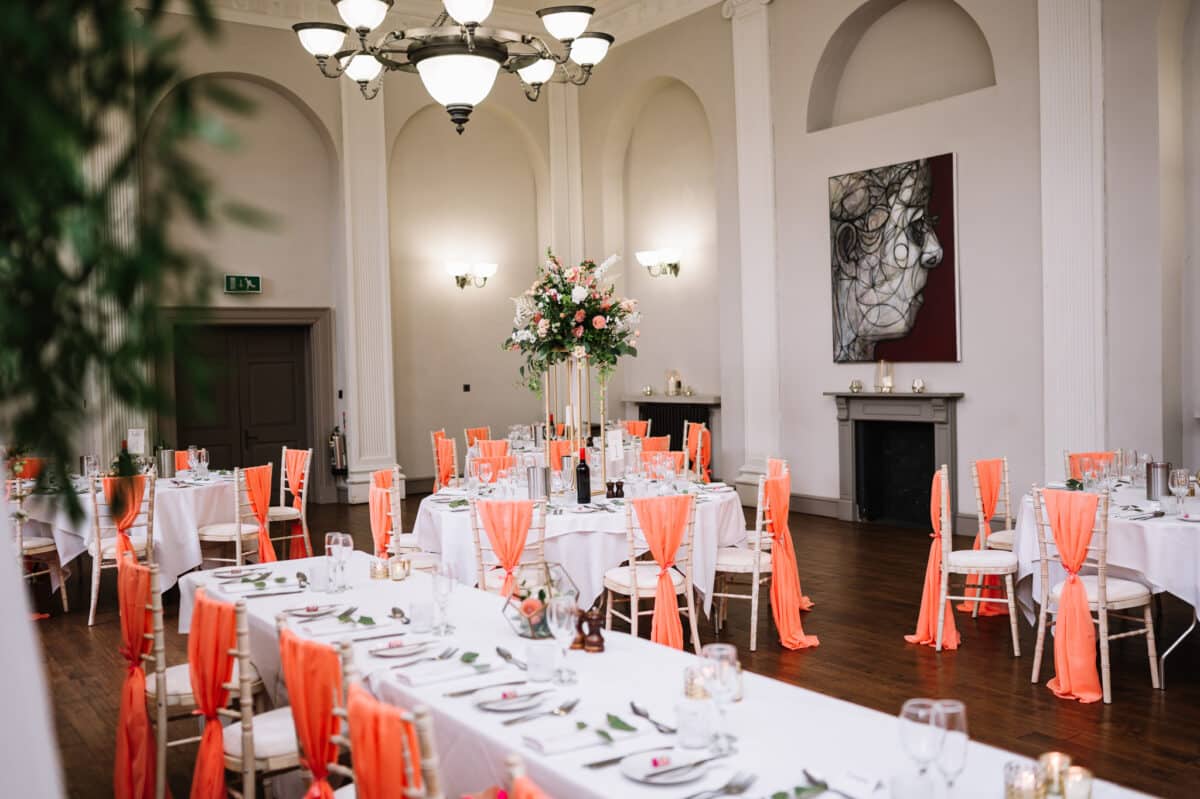 Kings Head Wedding decor of Gold Green and Orange Themed Wedding setup